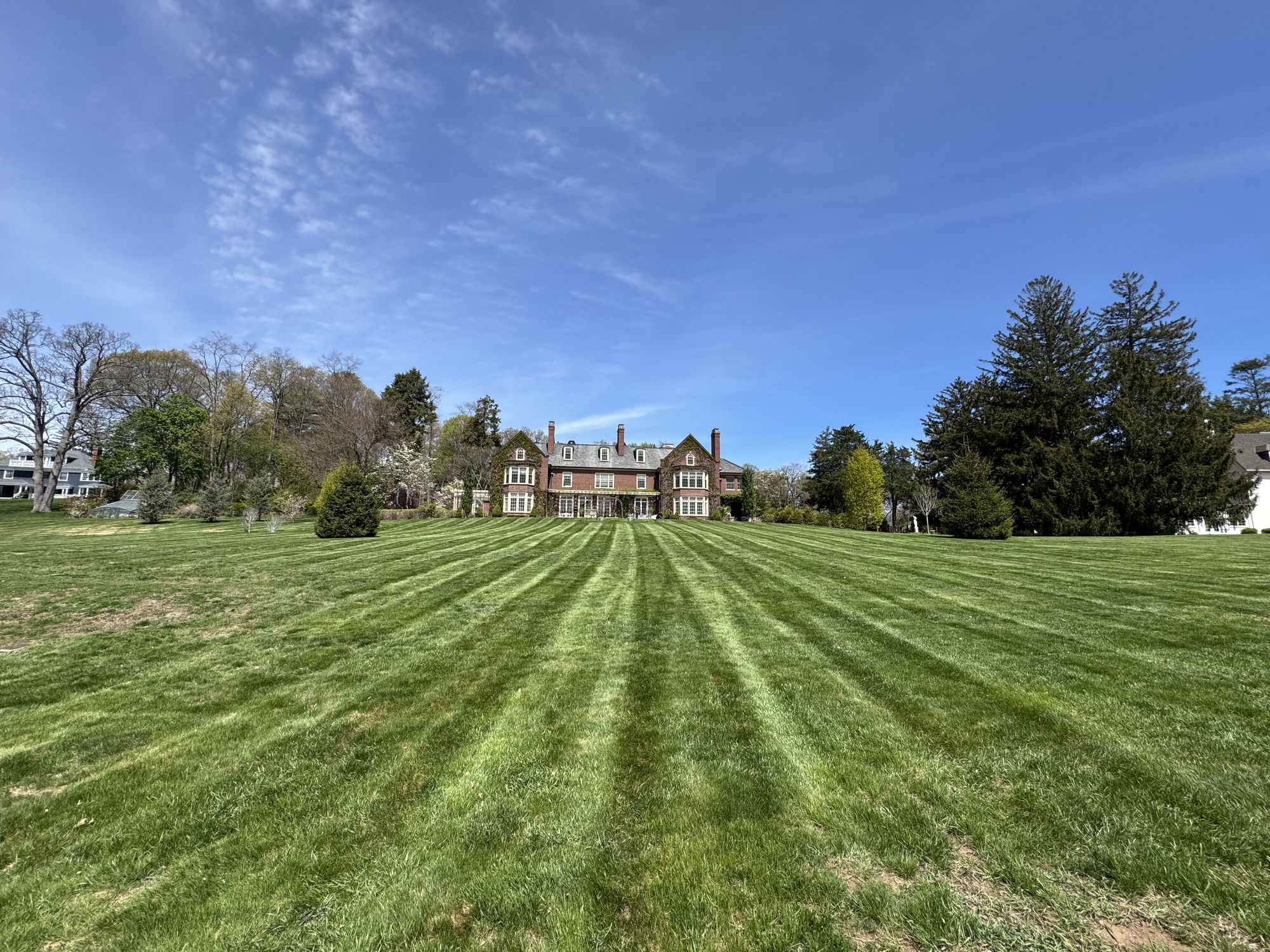 Grand estate with perfectly striped grounds